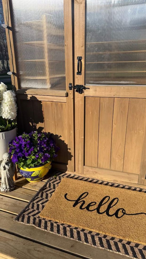 Hello doormat at the shed door